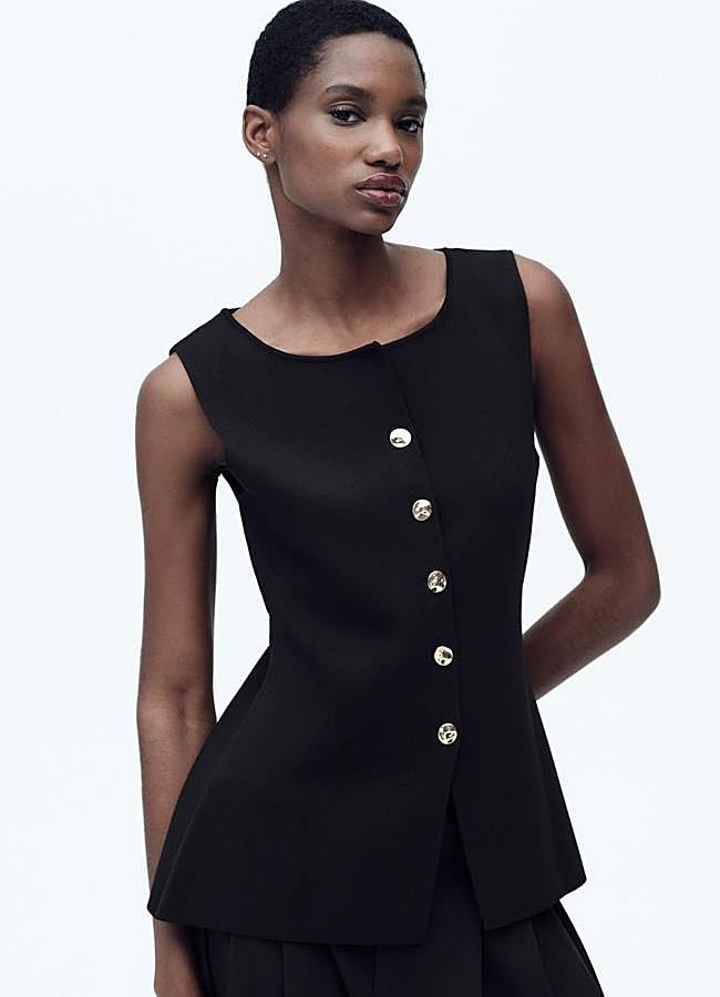 Imagen - Chaleco de punto negro con peplum