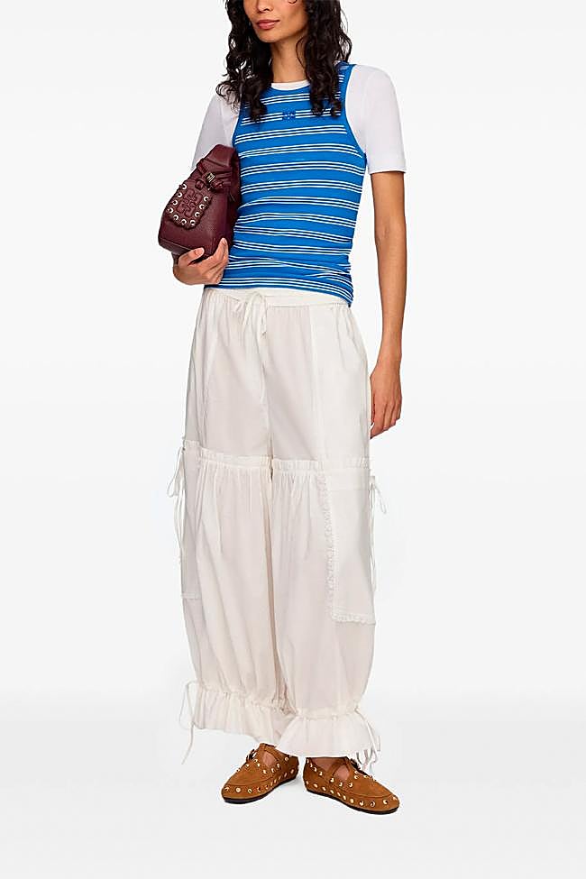Pantalones pololos en blanco de Ganni.