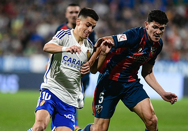 El Huesca asalta La Romareda con dos zarpazos