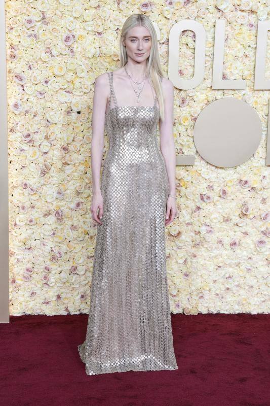 La francesa Elizabeth Debicki, que da vida a Lady Di en 'The Crown', se sumó al equipo de las mujeres vestidas de plata con un Dior Alta Costura. 