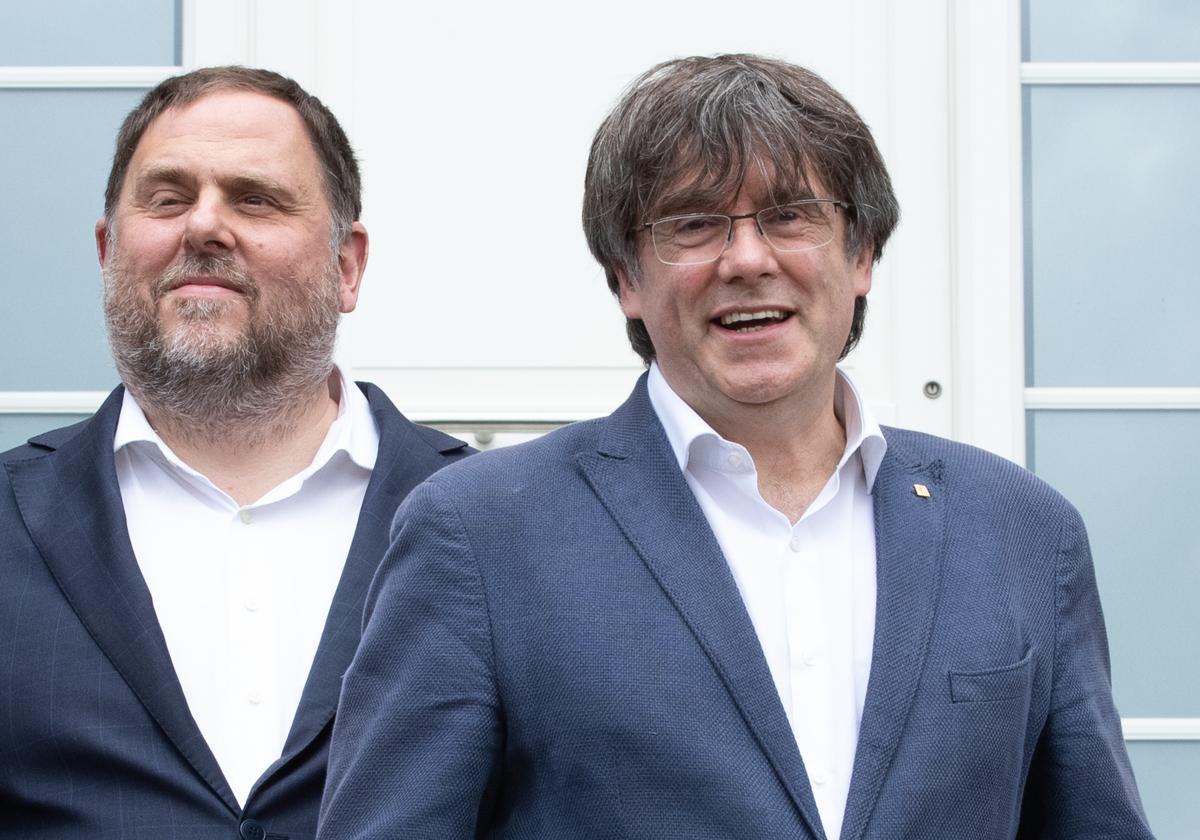 El líder de ERC, Oriol Junqueras, junto al expresident de la Generalitat, Carles Puigdemont