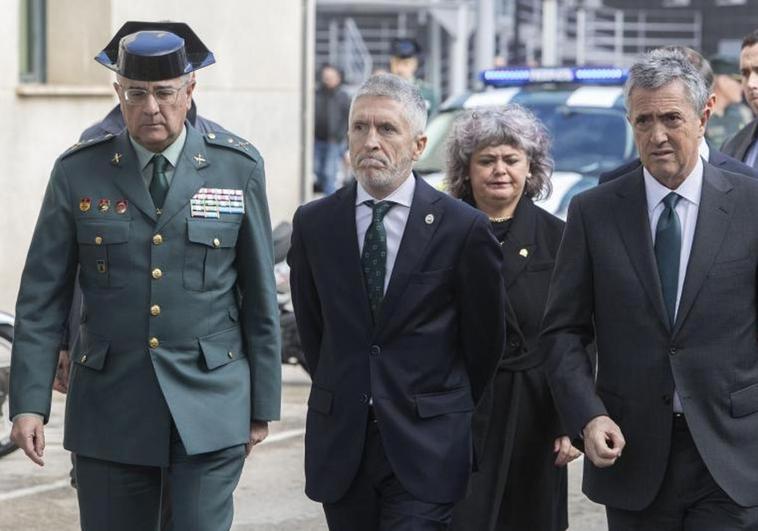 Fernando Grande-Marlaska, a su llegada a la capilla ardiente de los dos agentes.