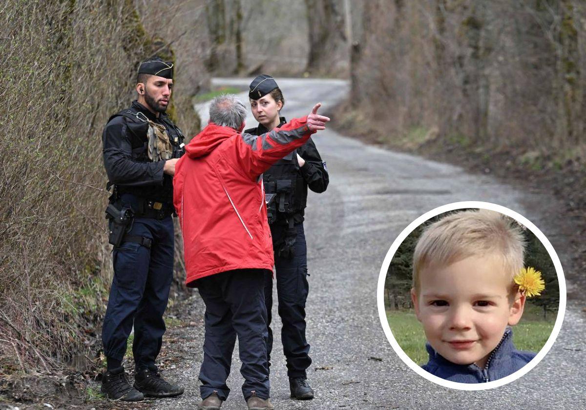 Dos agentes charlan con un vecino en la zona donde se han encontrado los restos de Émile. A la derecha, el pequeño.