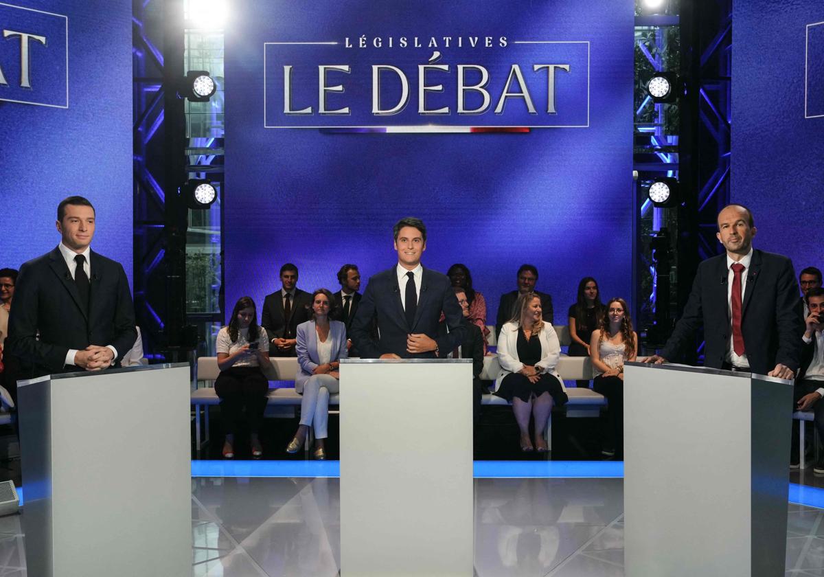 Jordan Bardella, Gabriel Attal y Manuel Bompard, durante el debate electoral.