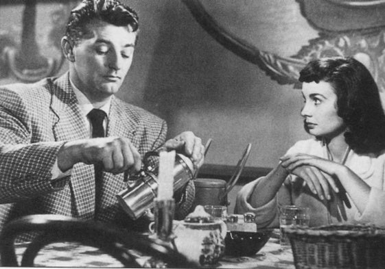 Robert Mitchum y Jean Simmons en 'Una cara con ángel'.