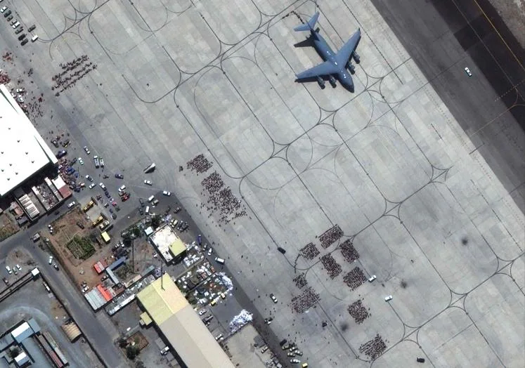 That moment in 2021 when desperate people were trying to leave Kabul airport.