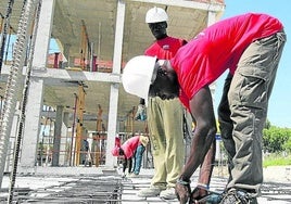 Trabajadores, en una obra.