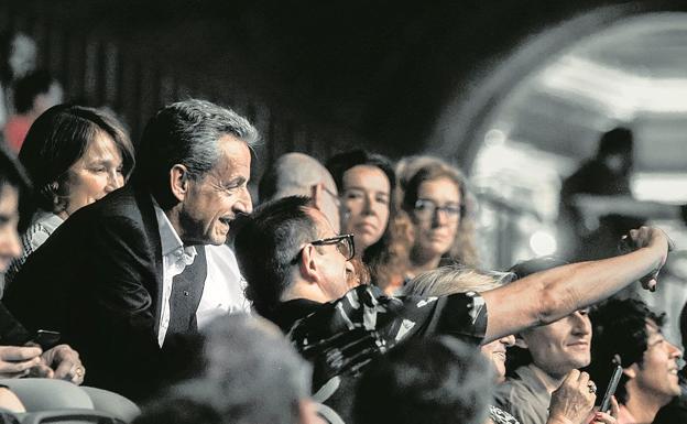 El expresidente, en un concierto de la exmodelo.