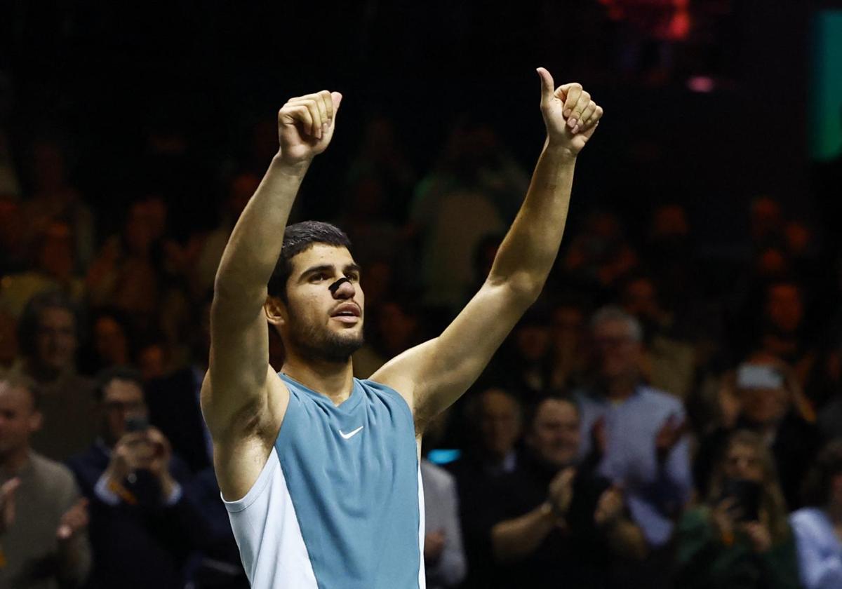 Carlos Alcaraz celebrates reaching the final in Rotterdam.