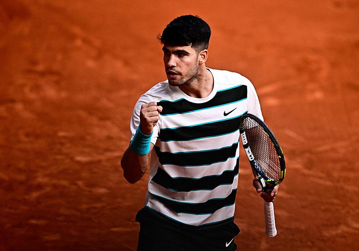 Carlos Alcaraz celebra un punto durante el partido ante Ben Shelton.