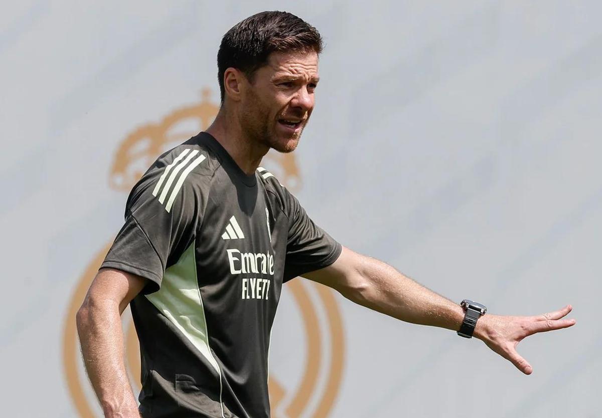 Xabi Alonso dons his work attire to begin preparing for the Club World Cup