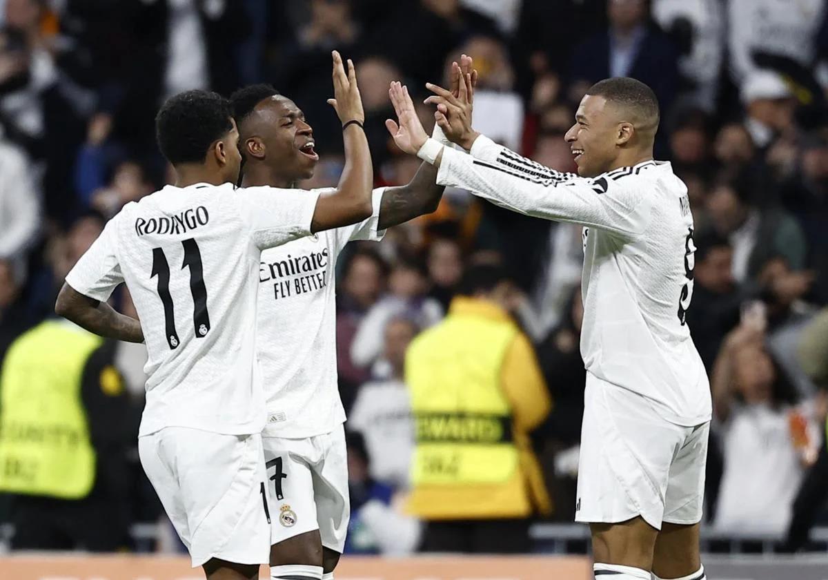 Rodrygo, Vinicius, and Mbappé celebrate one of the five goals Real Madrid scored against Salzburg in the Champions League.