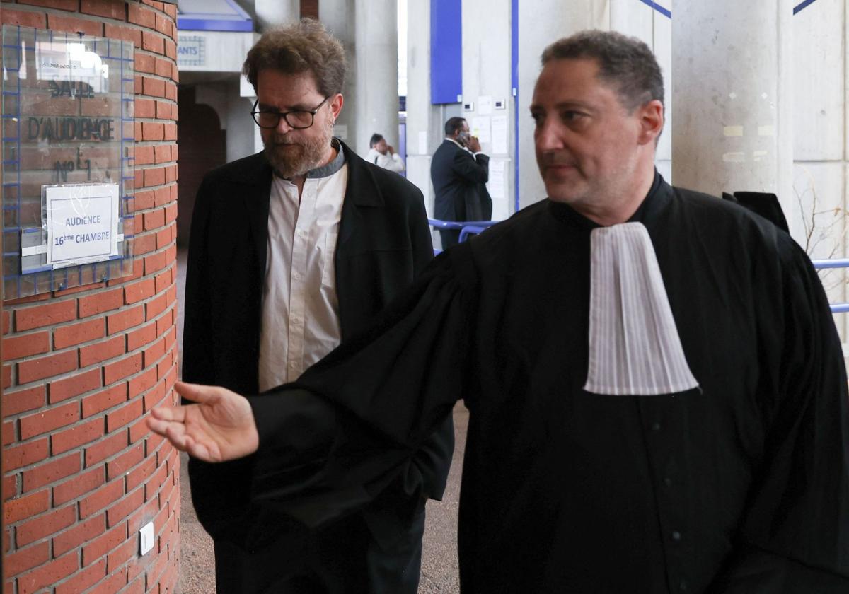 Former Ubisoft Vice President, Tommy Francois, walks behind his lawyer.