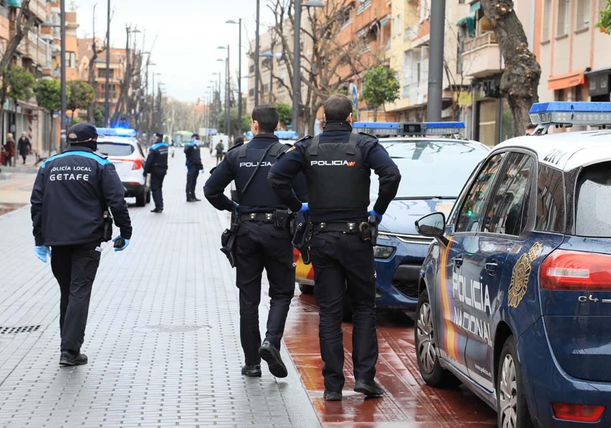 Several police cars during an operation in Getafe (Madrid).