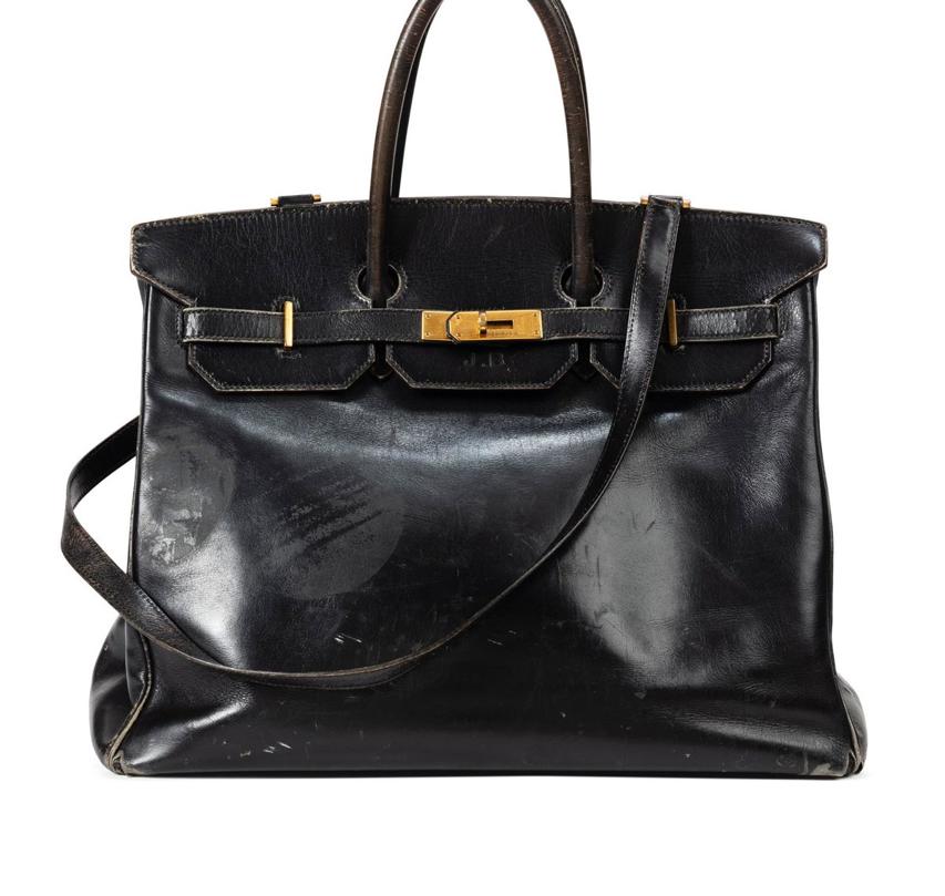 The original 'Birkin' bag by Hermès, made for actress Jane Birkin, is exhibited for the first time in Paris