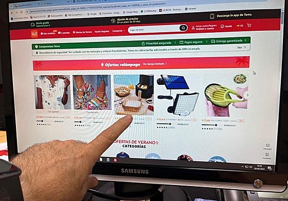 Un usuario consulta una página de la plataforma Temu.