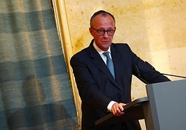 El canciller alemán, Friedrich Merz, visiblemente emocionado en un momento de su discurso en Múnich.