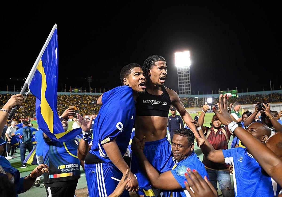 Curaçao players celebrate their unprecedented World Cup qualification.
