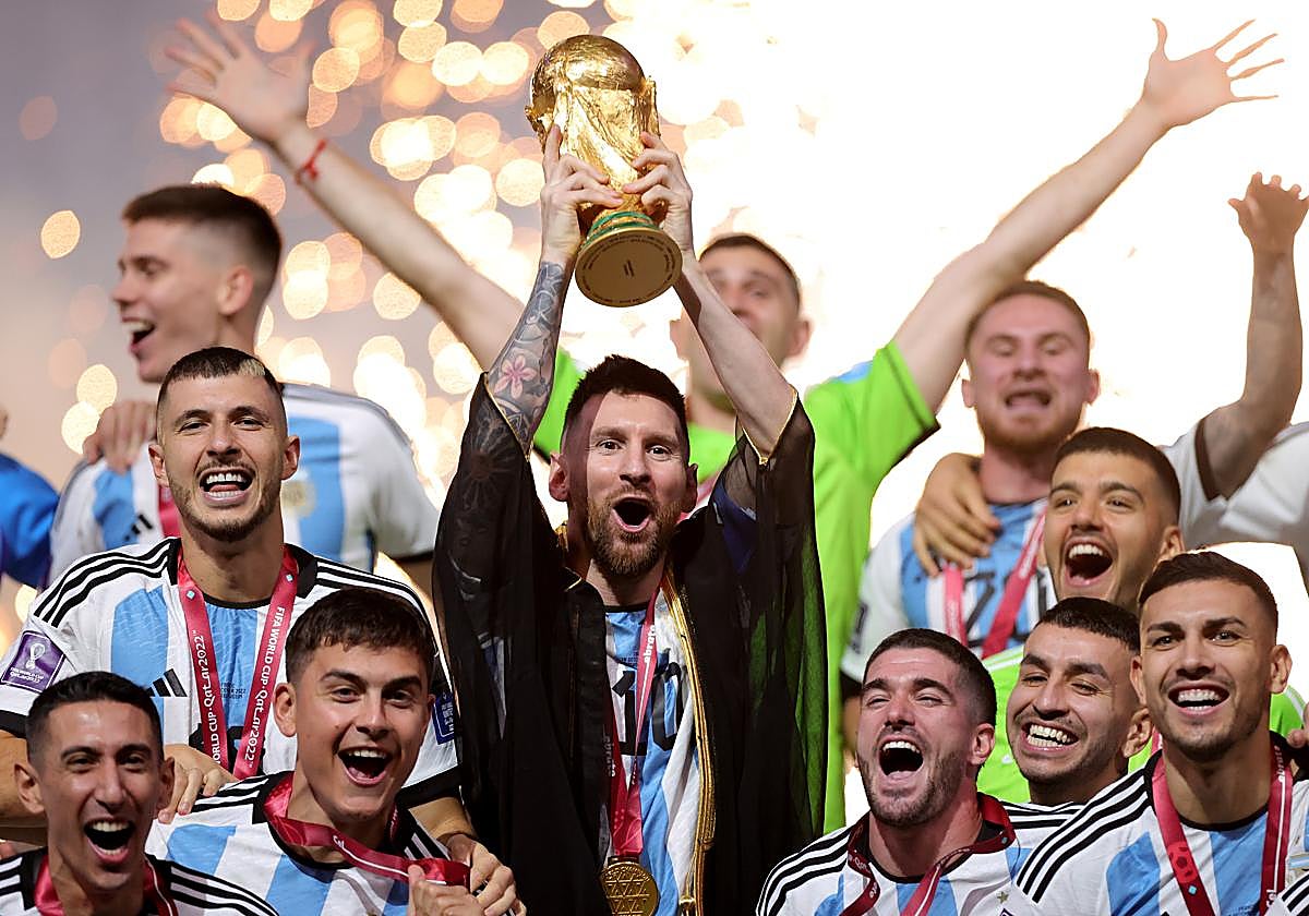 Messi lifts the World Cup trophy in Qatar 2022.