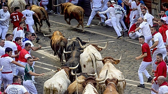 El sexto encierro de San Fermín, en imágenes