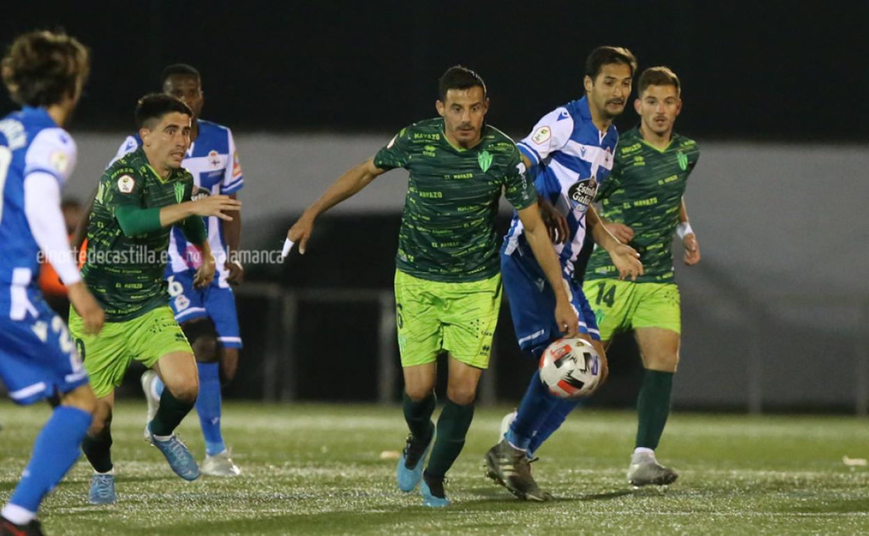 Cristóbal y Carlos Rubén, en una visita anterior del Deportivo a Guijuelo. 