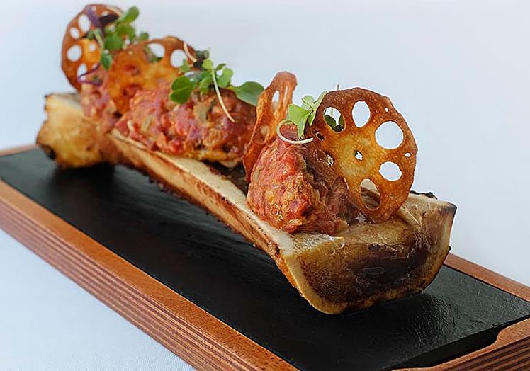 Imagen principal - Alguna de las elaboraciones que se pueden encontrar en el Mesón de Gonzalo. 