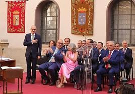 Iglesias y los diputados del PP, durante la toma de posesión.