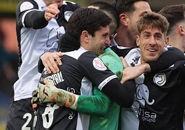Los jugadores de Unionistas de Salamanca celebran el pase a la siguiente ronda