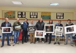 El jurado de la San Silvestre, con las fotografías galardonadas.