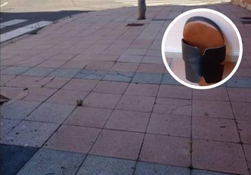 Rebajan la indemnización a una mujer que tropezó con unas baldosas rotas pero llevaba sandalias