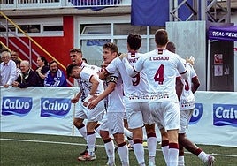 Los jugadores celebran uno de los goles en