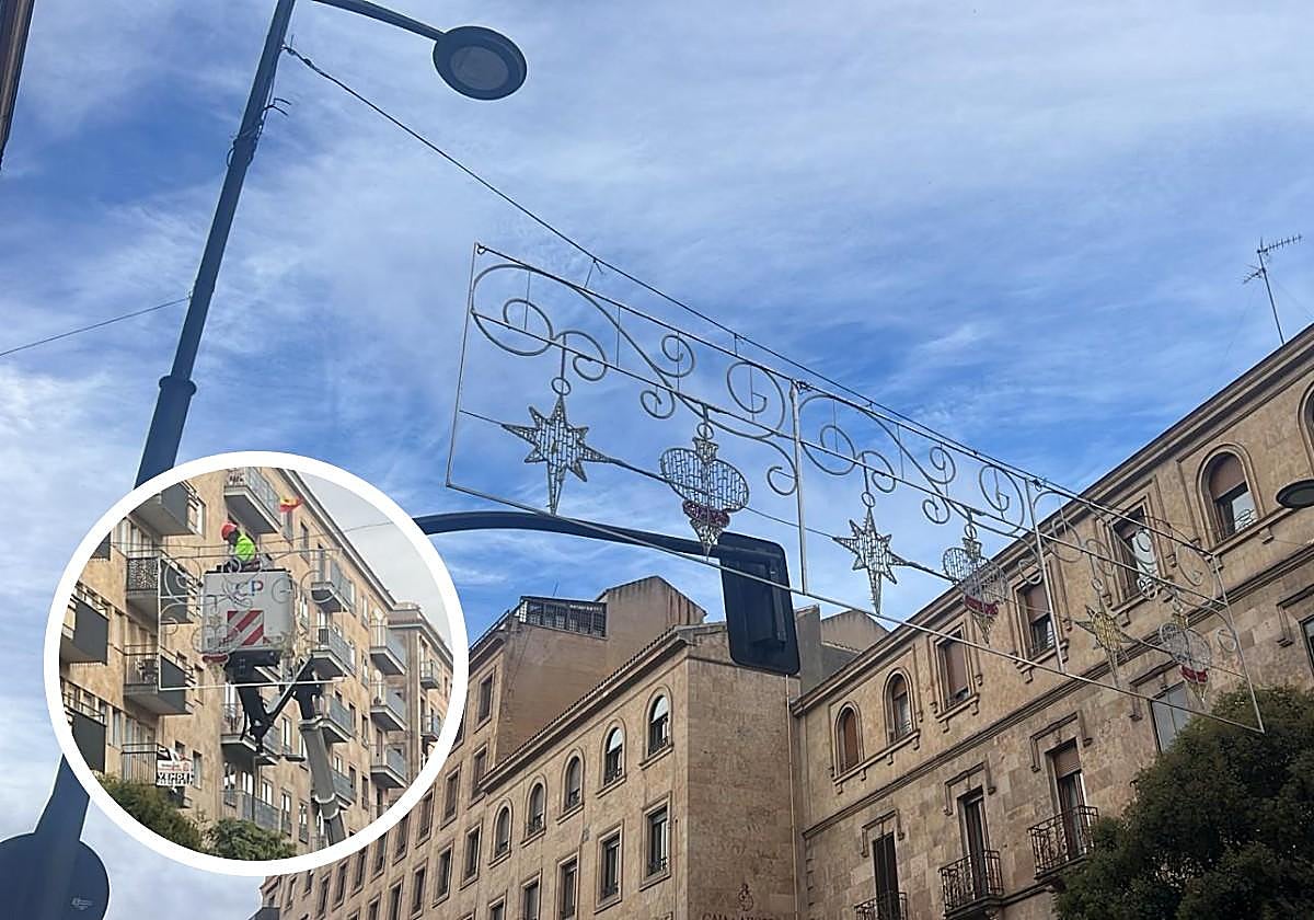 Adorno luminoso en la Gran Vía de Salamanca; en el círculo, un operario instala un adorno