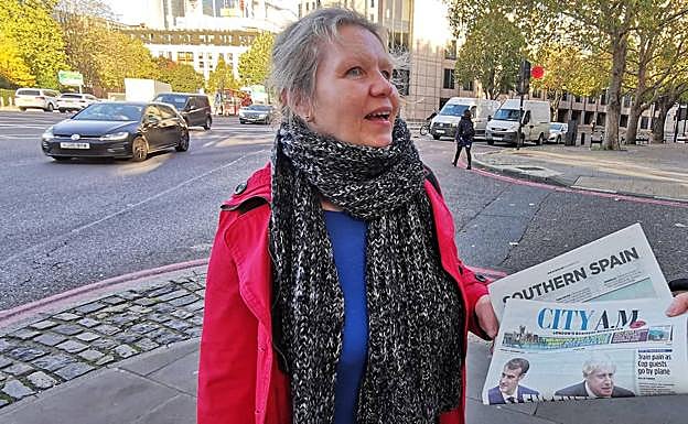 London commuter Helga Morady picks up her copy of City A.M. with the supplement inside.