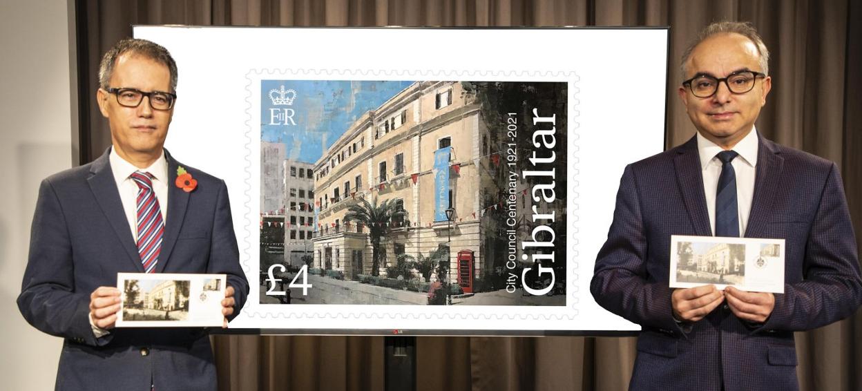 Vijay Daryanani (right) and Dr Joseph Garcia with the new stamps. 