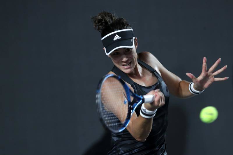 Muguruza celebrates winning the WTA tournament in Mexico