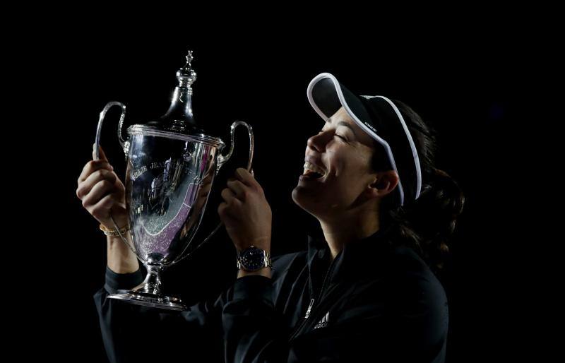 Muguruza celebrates winning the WTA tournament in Mexico
