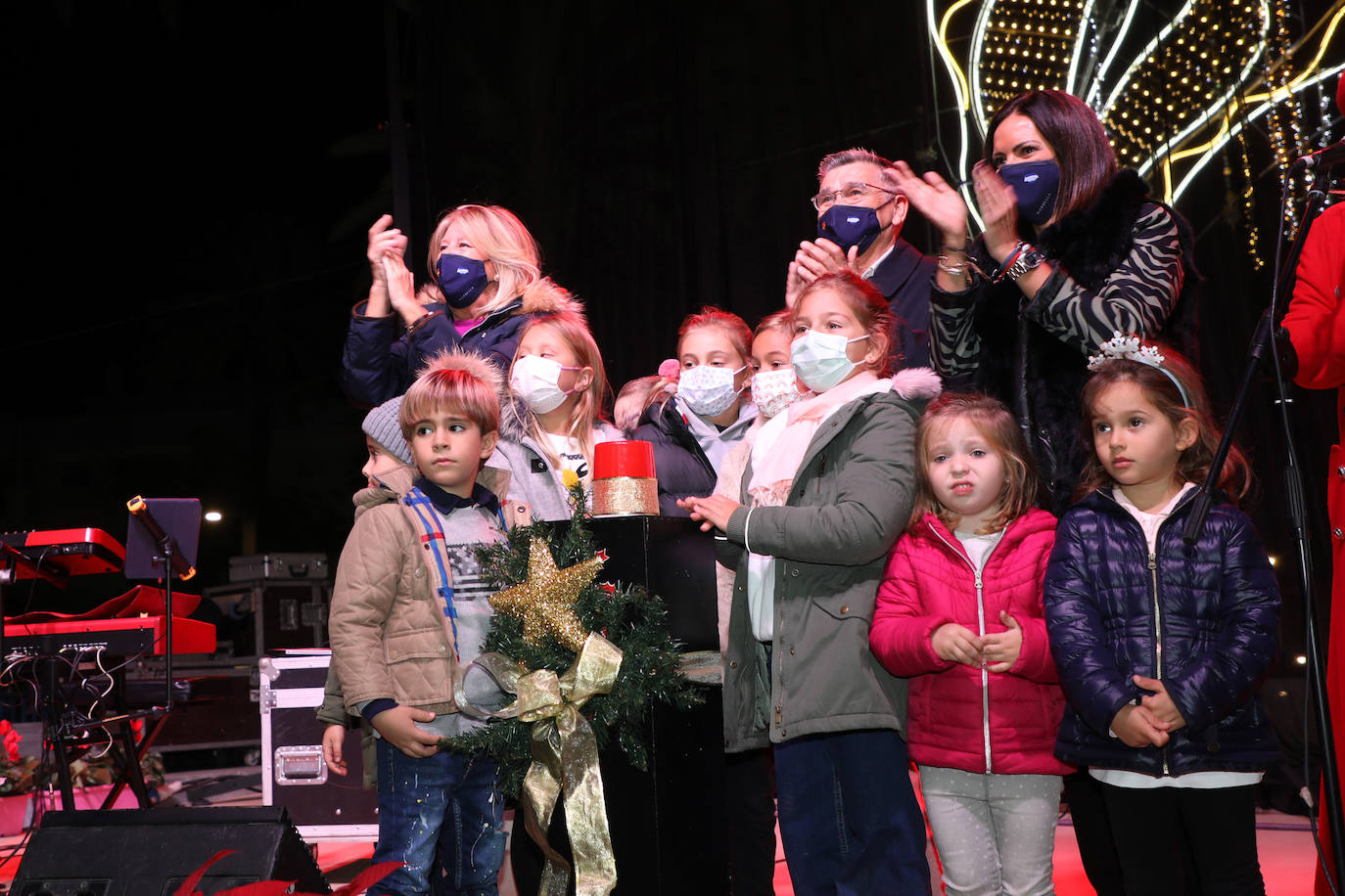 Crowds gathered at Marbella's Christmas lights despite the threat of rain.