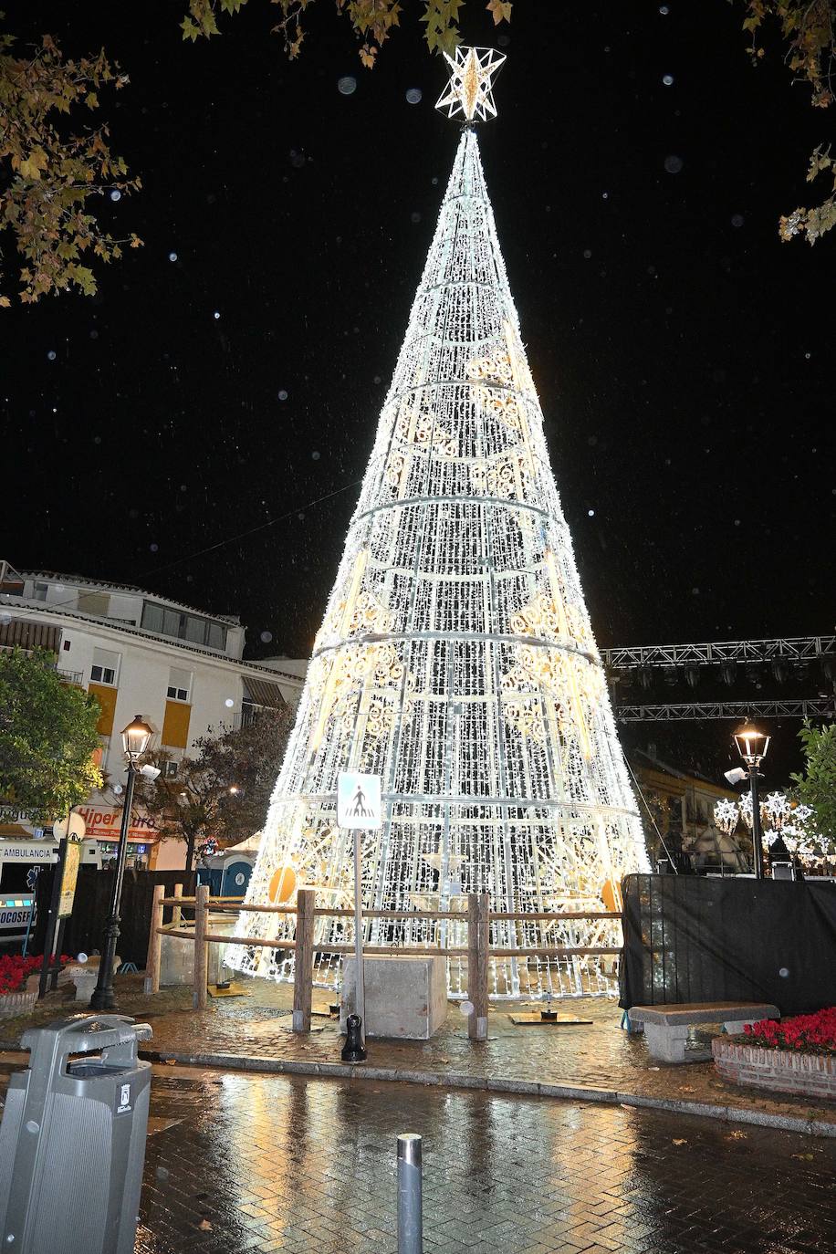 Crowds gathered at Marbella's Christmas lights despite the threat of rain.