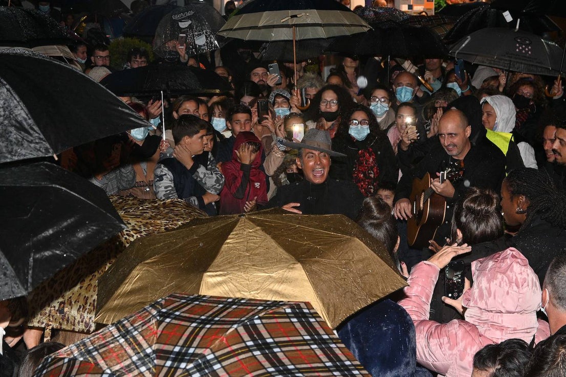 Crowds gathered at Marbella's Christmas lights despite the threat of rain.