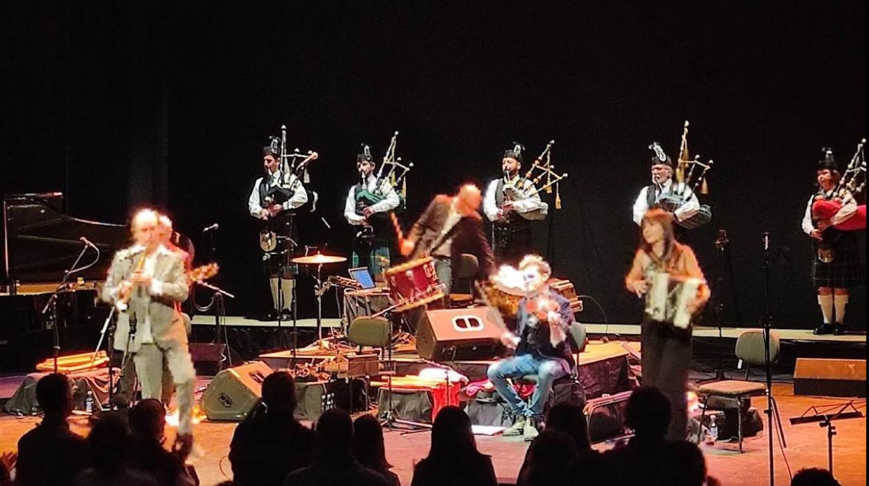 Leslie Thomson (2nd right) and The Sur Pipe Band on stage with Carlos Núñez in Cordoba last weekend. 