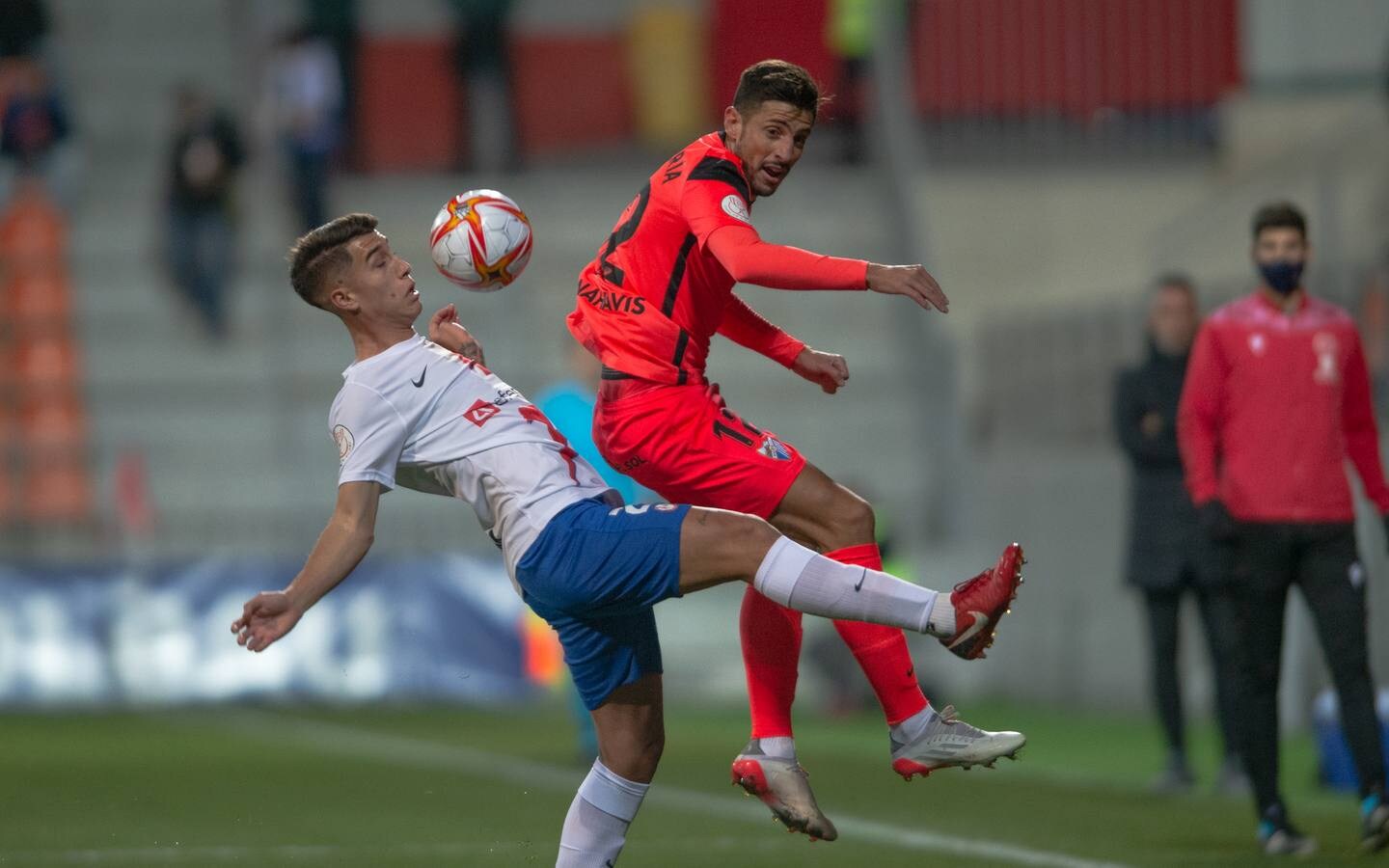 Chavarría challenges for the ball during Malaga's cup defeat. 