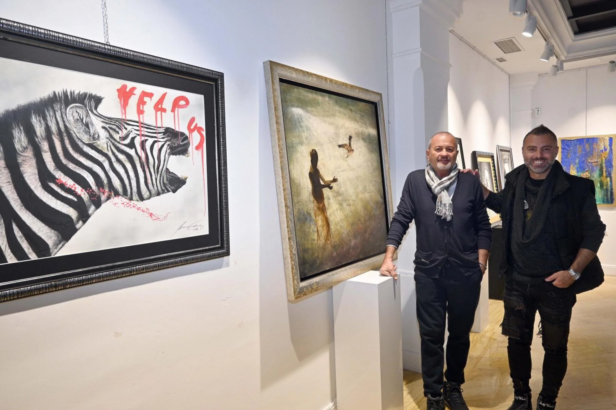 Massimo Cedrini, left, and the art direcor of Excellence Art Gallery in Marbella,Giusseppe Carnevale. 