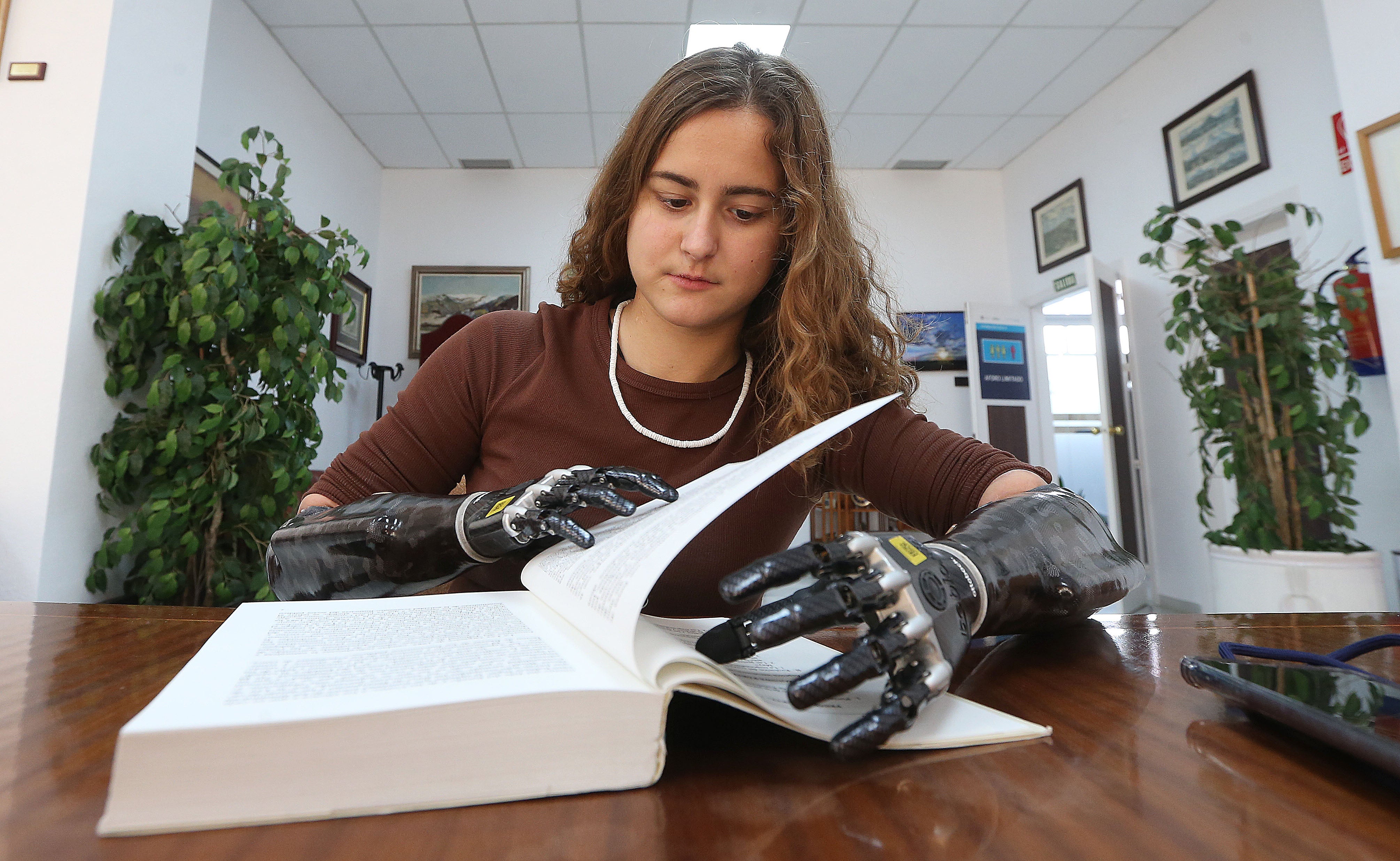 Sarah reading a book. 