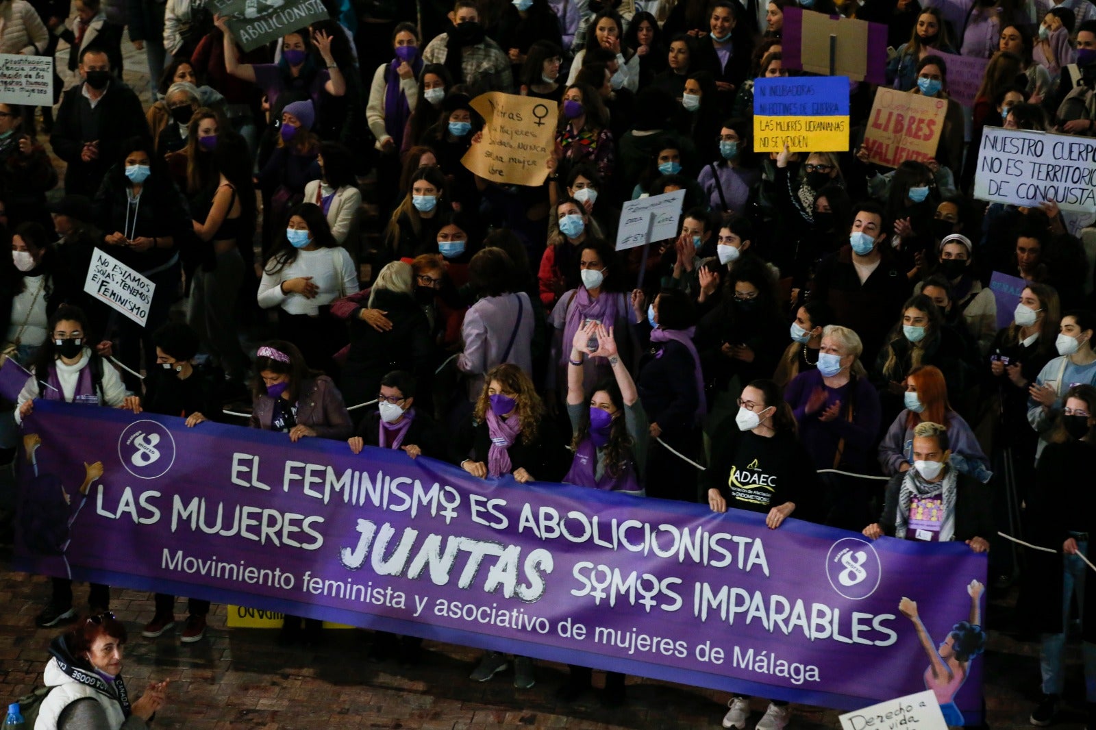 Protestors take to the streets of Malaga on Tuesday, 8 March 2022.