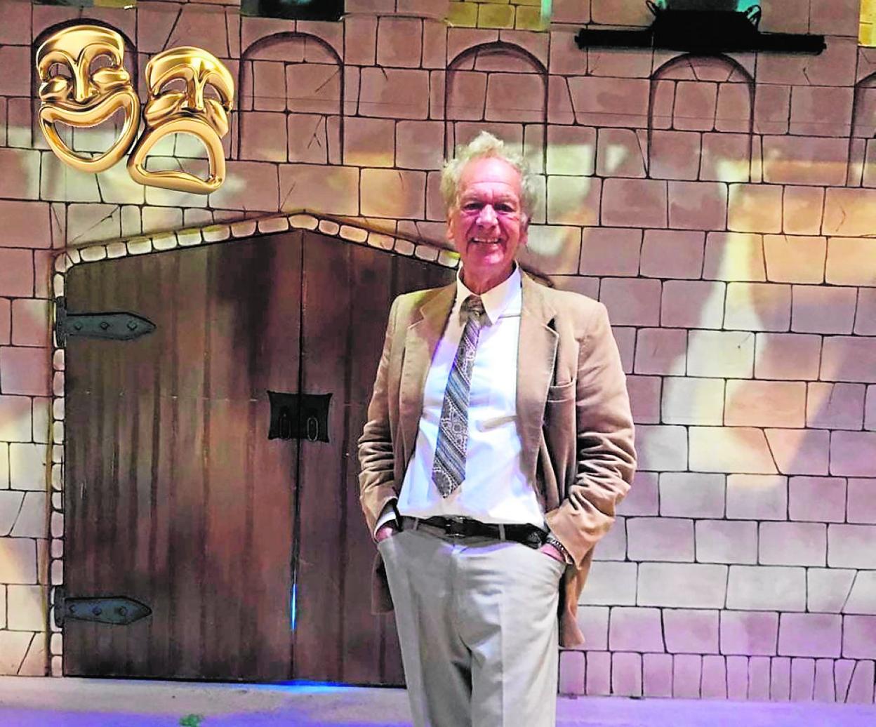 Peter Mitchell on the stage of the theatre, where he has directed over one hundred productions. 