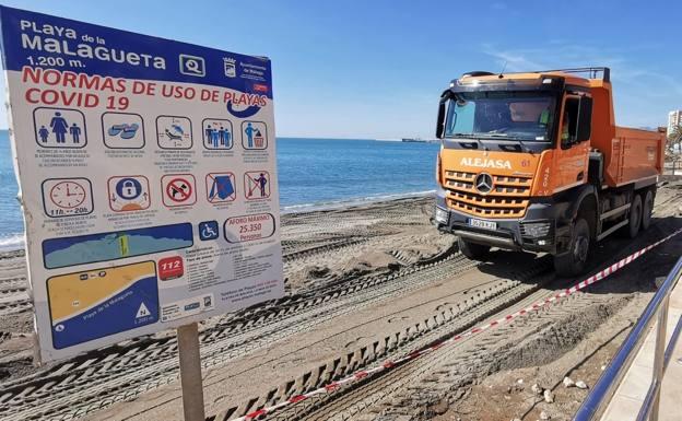 Works to restore La Malagueta beach, in Malaga. 