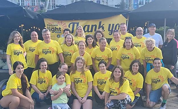 Imagen principal - Different group taking part in the Darkness into Light walks across the Costa del Sol and Gibraltar. 