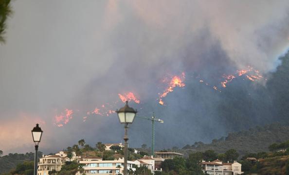 The flames were visible from several points in Malaga province.