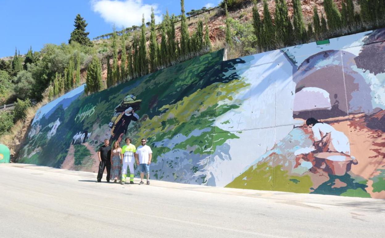 The new mural highlights some of the town’s traditions and customs. 
