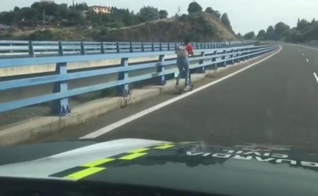 This is the shocking moment police stop an electric scooter rider on a motorway in Spain